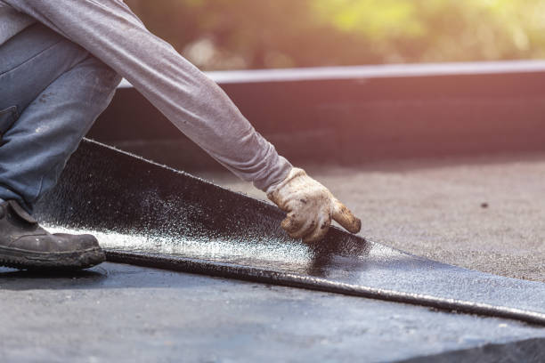 Professional Interior Drainage System technician working in Glenwood, NY